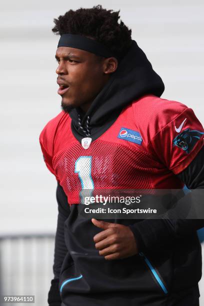 Cam Newton as he walks onto the field during the Carolina Panthers minicamp on June 13 at the Carolina Panthers practice facility in Charlotte, N.C.