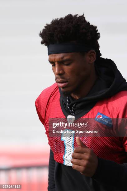 Cam Newton as he walks onto the field during the Carolina Panthers minicamp on June 13 at the Carolina Panthers practice facility in Charlotte, N.C.