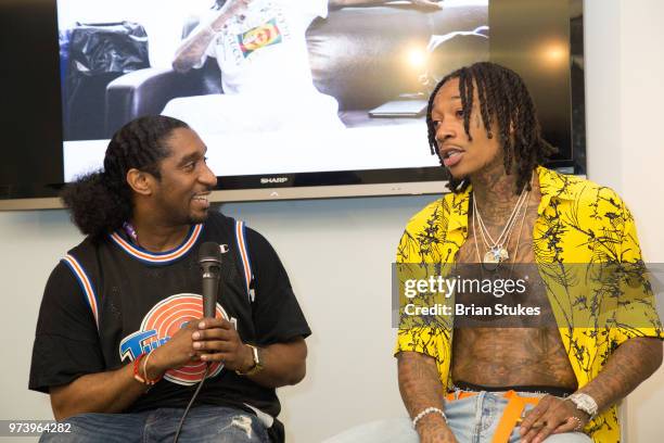 Aladdin Da Prince and Wiz Khalifa host Q&A during meet and greet at Radio One on June 13, 2018 in Silver Spring, Maryland.