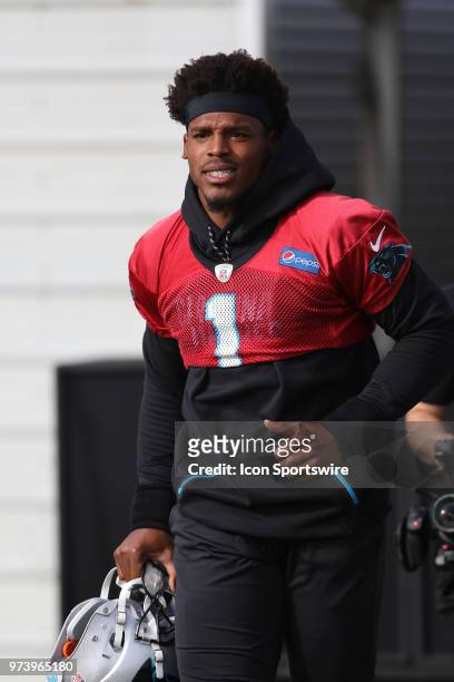 Cam Newton as he walks onto the field during the Carolina Panthers minicamp on June 13 at the Carolina Panthers practice facility in Charlotte, N.C.