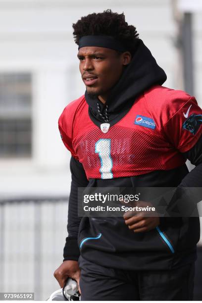 Cam Newton as he walks onto the field during the Carolina Panthers minicamp on June 13 at the Carolina Panthers practice facility in Charlotte, N.C.