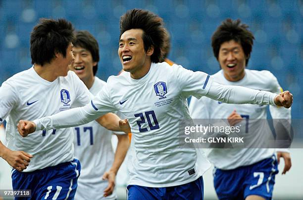 South Korea's striker Lee Dong-Gook celebrates scoring a goal during their International friendly football match against Ivory Coast at Loftus Road...