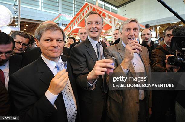 French Agriculture Minister Bruno Le Maire next to Europe's incoming farming commissioner, Romanian national Dacian Ciolos and president of the...