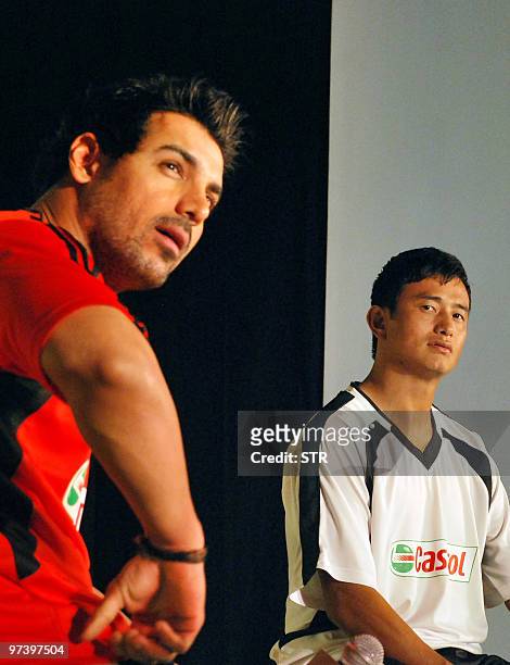 Indian footballer Baichung Bhutia and Bollywood actor John Abraham in their roles as Castrol Brand Ambassadors attend a Castrol pre-2010 FIFA world...