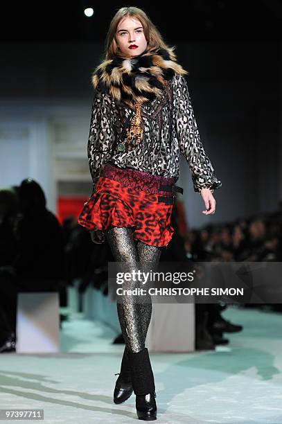 Model displays a creation as part of Just Cavalli Fall-Winter 2010-2011 ready-to-wear collection on February 25, 2010 during the Women's fashion week...