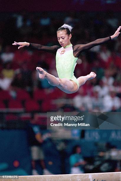 Summer Olympics: China Dong Fangxiao in action during Women's Individual All Around Final at Sydney SuperDome. Sydney, Australia 9/21/2000 CREDIT:...