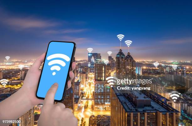 smart phone and wireless communication - yangyang stock pictures, royalty-free photos & images
