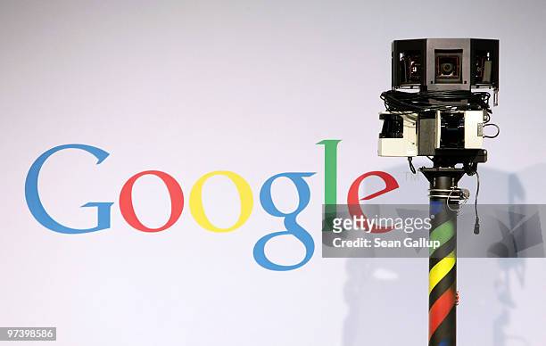 The camera of a German Google Street View car looms over the car next to the Google logo at the Google stand at the CeBIT Technology Fair on March 3,...