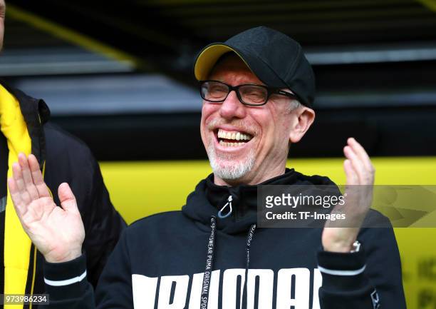 Head coach Peter Stoger of Dortmund laughs prior to the Bundesliga match between Borussia Dortmund and Eintracht Frankfurt at Signal Iduna Park on...