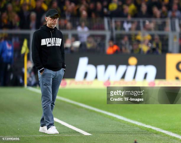 Head coach Peter Stoeger of Dortmund looks on during the Bundesliga match between Borussia Dortmund and Eintracht Frankfurt at Signal Iduna Park on...