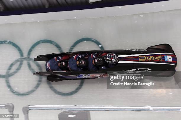 Winter Olympics: USA Team 1 Steven Holcomb, Steve Mesler, Curtis Tomasevicz, Justin Olsen in action during Four Man Bobsled at Whistler Sliding...