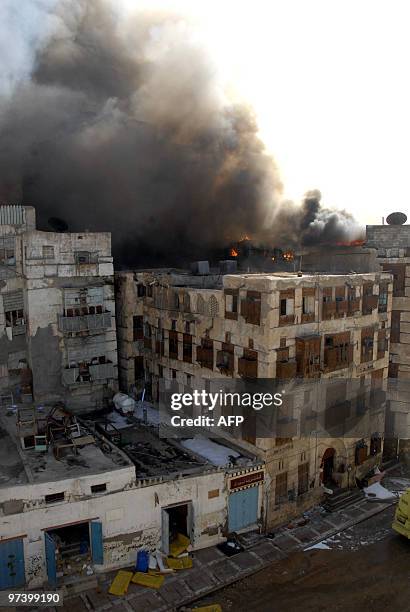 Fires rage in more than one old building in the historic quarter of the Saudi Red Sea port city of Jeddah on March 3, 2010. Ten firebrigade teams...