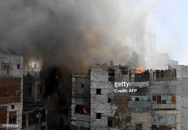 Fires rage in more than one old building in the historic quarter of the Saudi Red Sea port city of Jeddah on March 3, 2010. Ten firebrigade teams...