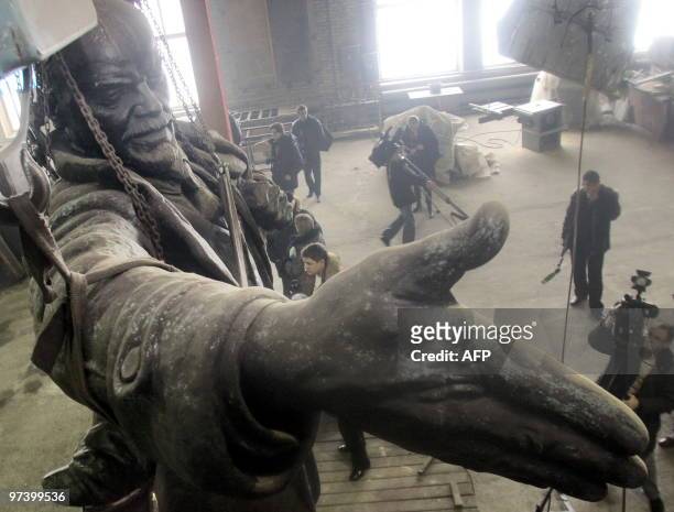 Monument of Soviet Union founder Vladimir Lenin in seen under repair in St. Petersburg on March 2, 2010. Vandals set off an explosion on April 1,...