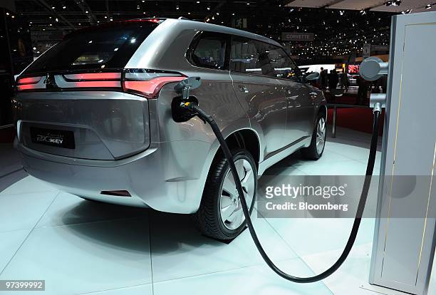 Mitsubishi PX-Miev concept automobile is seen charging on the second press day of the Geneva International Motor Show in Geneva, Switzerland, on...