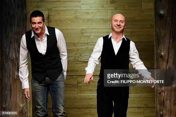 Fashion designers Domenico Dolce and Stefano Gabbana acknowledge the audience at the end of D&G Fall-Winter 2010-2011 ready-to-wear collection on...