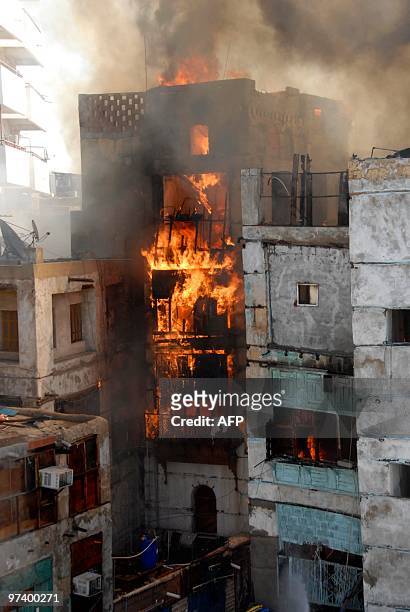 Fires rage in old buildings in the historic quarter of the Saudi Red Sea port city of Jeddah on March 3, 2010. Ten firebrigade teams were in the...