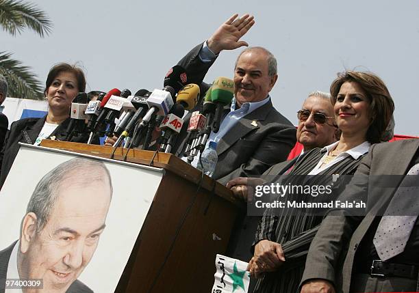 Former Iraqi Prime Minister Iyad Allawi and head of the secular Iraqiya list waves to his supporters at an election campaign rally on March 3, 2010...