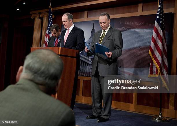 Sen. Sherrod Brown and Sen. Charles Schumer listen as Sen. Bob Casey speaks during a news conference on Capitol Hill March 3, 2010 in Washington, DC....