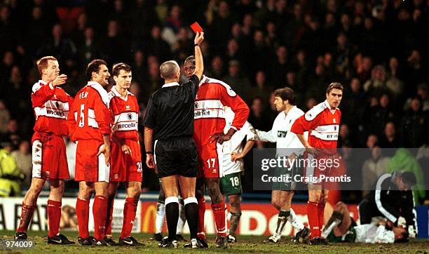 Ugo Ehiogu of Middlesbrough is sent off by referee Mike Dean during the AXA sponsored FA Cup fourth round replay match between Wimbledon and...
