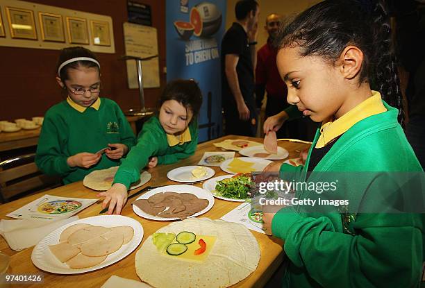 Children from Lime Street School make sandwiches for their favourite players, which will then be judged by Ben Cohen of Sale Sharks and Ole Gunnar...