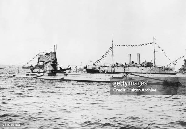 The Royal Navy B-class submarine HMS B11 under the command of Lieutenant Norman Douglas Holbrook on its return to Malta after torpedoing and sinking...
