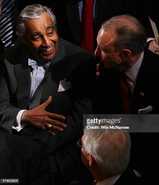 Rep. Charles Rangel talks with Sen. Arlen Specter before the start of a memorial service for Rep. John Murtha at the U.S. Capitol March 3, 2010 in...