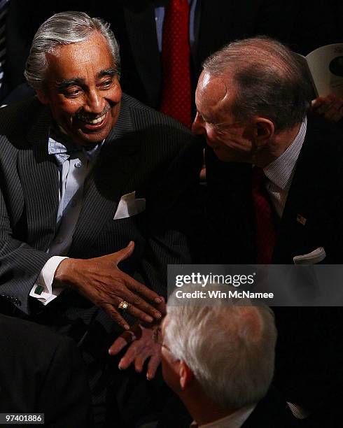 Rep. Charles Rangel talks with Sen. Arlen Specter before the start of a memorial service for Rep. John Murtha at the U.S. Capitol March 3, 2010 in...