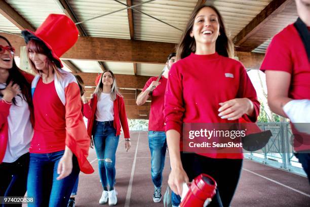 group of supporters going to stadium - stadium entrance stock pictures, royalty-free photos & images