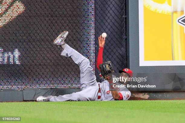 Billy Hamilton of the Cincinnati Reds makes a play against the Kansas City Royals during the ninth inning at Kauffman Stadium on June 13, 2018 in...