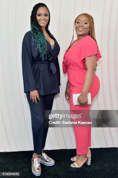 Denisia 'Blu June' Andrews and Brittany "Chi" Coney of NOVA Wav, wearing Max Mara, attend the Women In Film 2018 Crystal + Lucy Awards presented by...