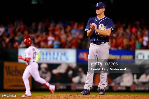 Eric Lauer of the San Diego Padres reacts after giving up a two-run home run against the St. Louis Cardinals in the sixth inning at Busch Stadium on...