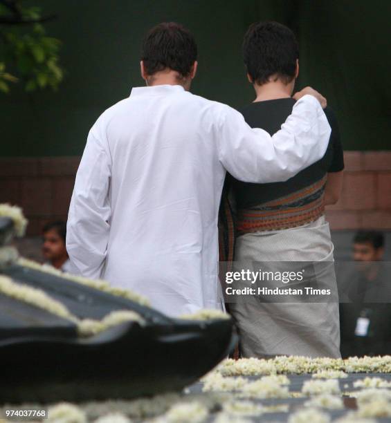 Congress leaders Rahul Gandhi and his sister Priyanka Gandhi Vadra pay homage at the memorial of their father and former Prime Minister Rajiv Gandhi...