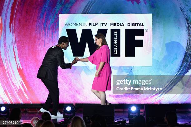 Honoree Victoria Alonso accepts The Lexus Beacon Award from Isaach de Bankole onstage during the Women In Film 2018 Crystal + Lucy Awards presented...