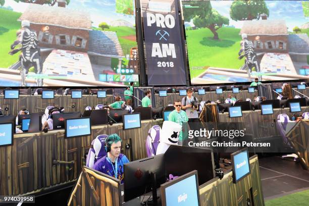 Gamers 'Ninja' and 'Marshmello' compete in the Epic Games Fortnite E3 Tournament at the Banc of California Stadium on June 12, 2018 in Los Angeles,...