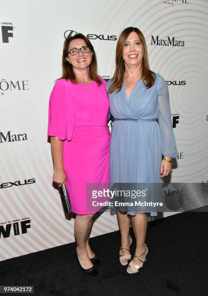 Honoree Victoria Alonso and Executive Director of Women In Film, Los Angeles Kirsten Schaffer attend the Women In Film 2018 Crystal + Lucy Awards...