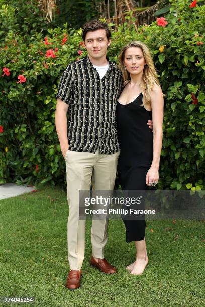 Nick Robinson and Amber Heard attend the 2018 Maui Film Festival's Taste of Summer opening party on June 13, 2018 in Wailea, Hawaii.