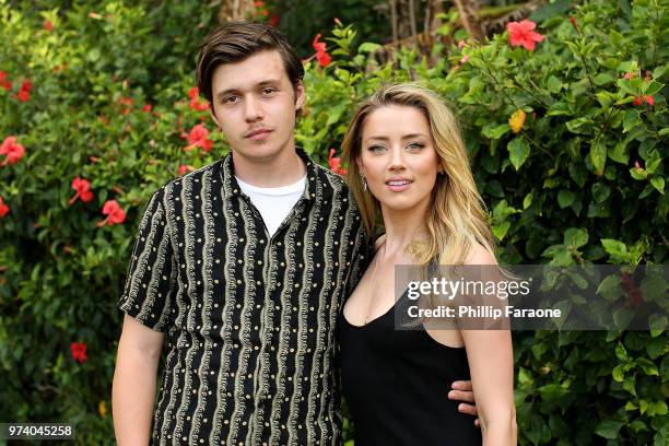 Nick Robinson and Amber Heard attend the 2018 Maui Film Festival's Taste of Summer opening party on June 13, 2018 in Wailea, Hawaii.