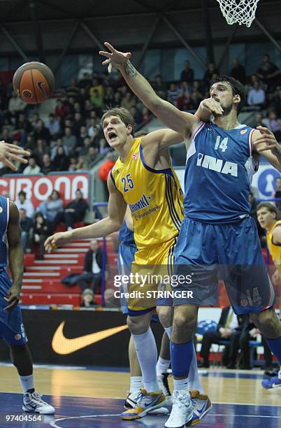 Khimki'sMozgov Timfey vies with Cibona's Dalibor Bagaric during their Euroleague basketball Khimki vs Cibona match in Zagreb, Croatia on March 03,...