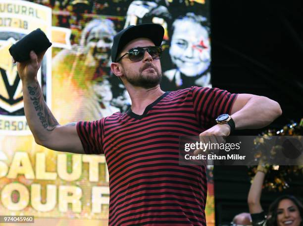 Tomas Tatar of the Vegas Golden Knights throws T-shirts to the crowd as he is introduced at the team's "Stick Salute to Vegas and Our Fans" event at...