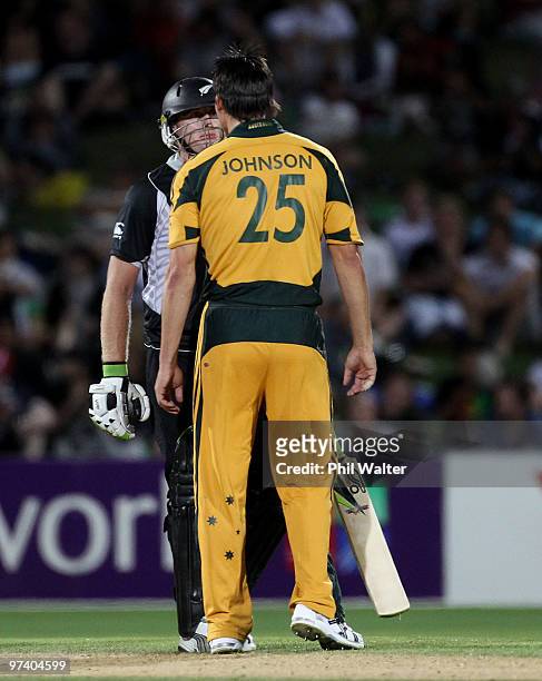 Mitchell Johnson of Australia and Scott Styris of New Zealand touch heads during the First One Day International match between New Zealand and...