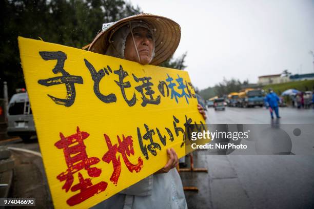 Anti U.S. Base protesters stage a rally outside the U.S Base Camp Schwab on June 14, 2018 in Nago, Okinawa prefecture, Japan. Protesters stage a...