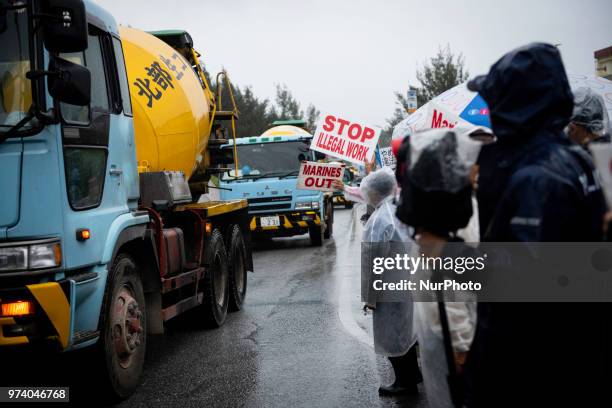 Anti U.S. Base protesters stage a rally outside the U.S Base Camp Schwab on June 14, 2018 in Nago, Okinawa prefecture, Japan. Protesters stage a...