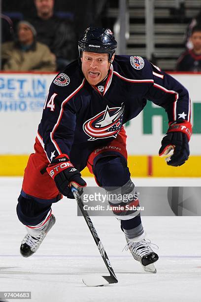 Forward Raffi Torres of the Columbus Blue Jackets skates with the puck against the Vancouver Canucks on March 2, 2010 at Nationwide Arena in...