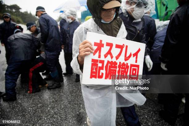 Anti U.S. Base protesters stage a rally outside the U.S Base Camp Schwab on June 14, 2018 in Nago, Okinawa prefecture, Japan. Protesters stage a...