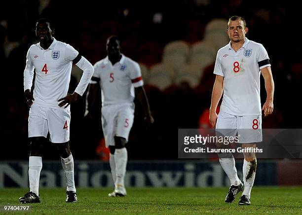 Fabrice Muamba, Micah Richards and Lee Cattermole of England show their dissapointment after coceding the second goal during the UEFA Under 21...