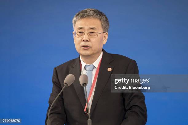 Guo Shuqing, deputy governor of the People's Bank of China and chairman of the China Banking Regulatory Commission, speaks during the Lujiazui Forum...