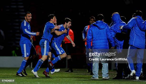 Ioannis Papadopoulos of Greece celebrates scoring the second goal during the UEFA Under 21 Championship Qualifying match between England and Greece...