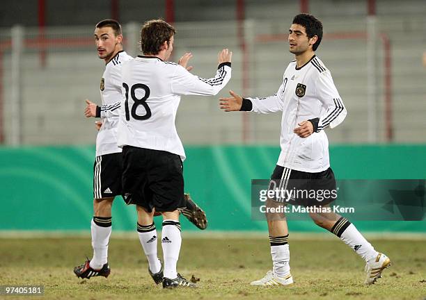 Mehmet Ekici of Germany jubilates with team mates after scoring his team' second goal during the U20 international friendly match between Germany and...