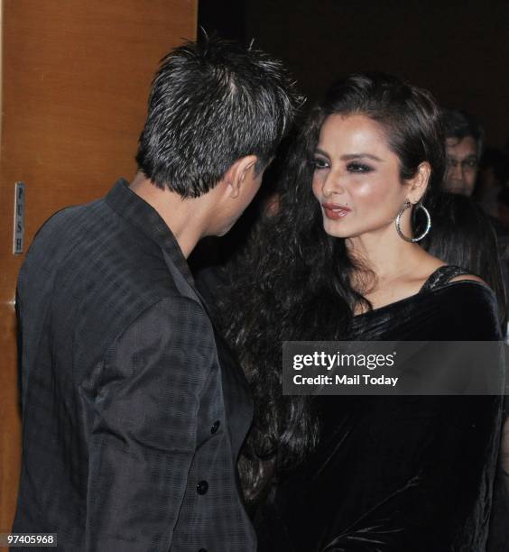 Rekha chats with Shah Rukh Khan at Big Pictures' success bash held in Mumbai on February 28, 2010.